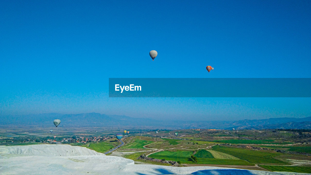 HOT AIR BALLOONS FLYING IN SKY
