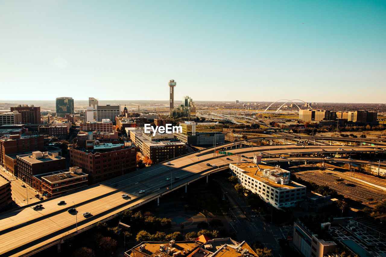 High angle view of buildings against clear sky