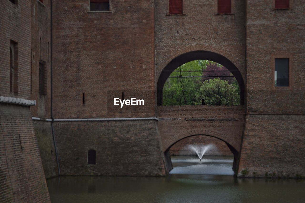 VIEW OF BUILDING WITH WATER