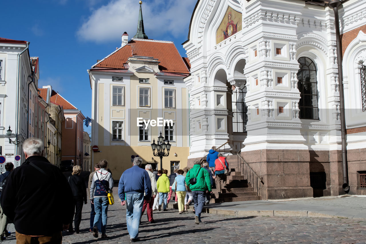 People walking towards church