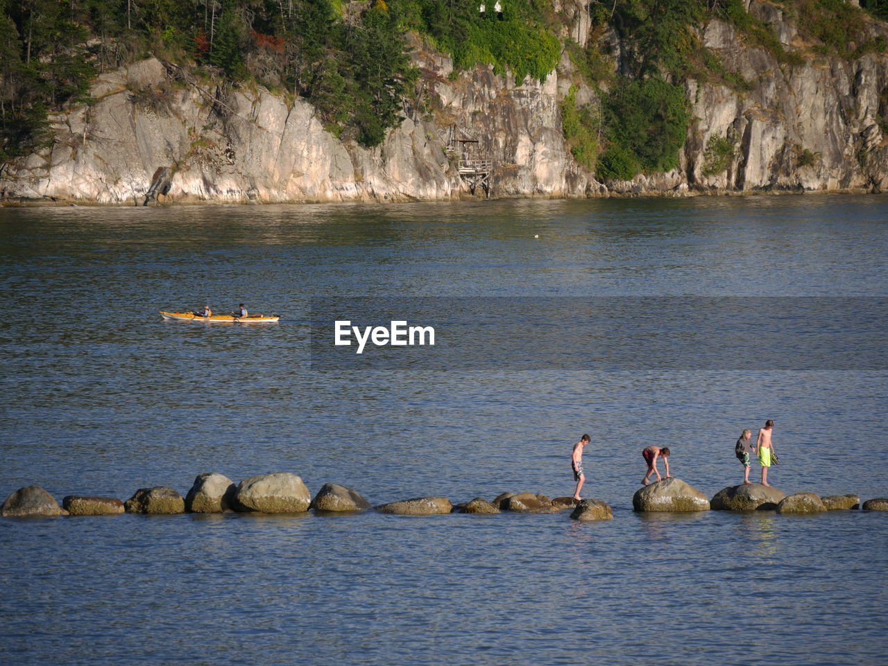 Men fishing in sea