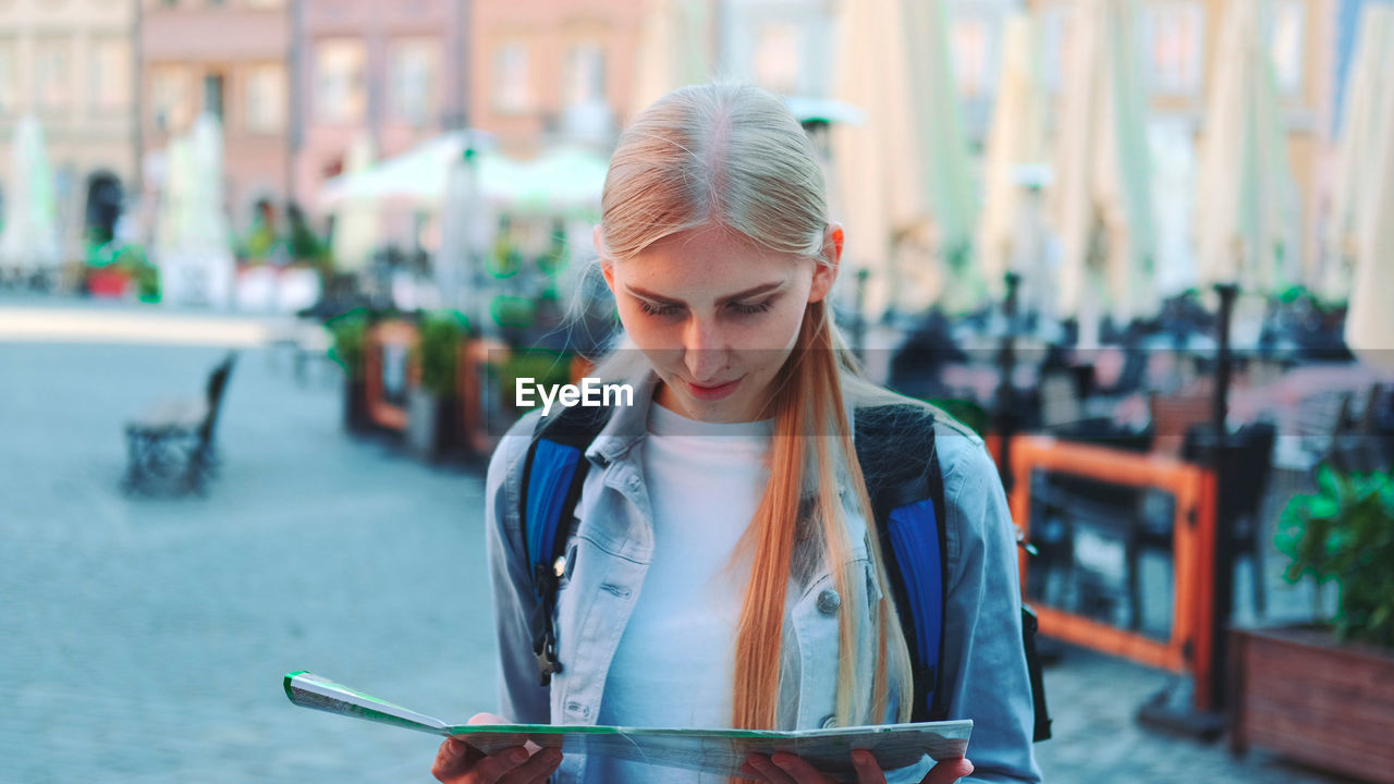 portrait of young woman using mobile phone