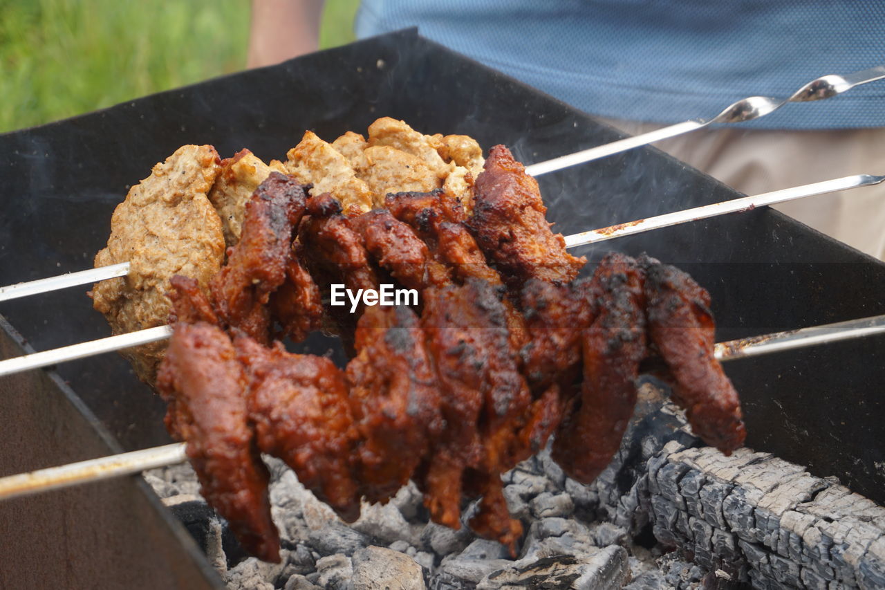 High angle view of vegan meat -soyshlik- on barbecue grill