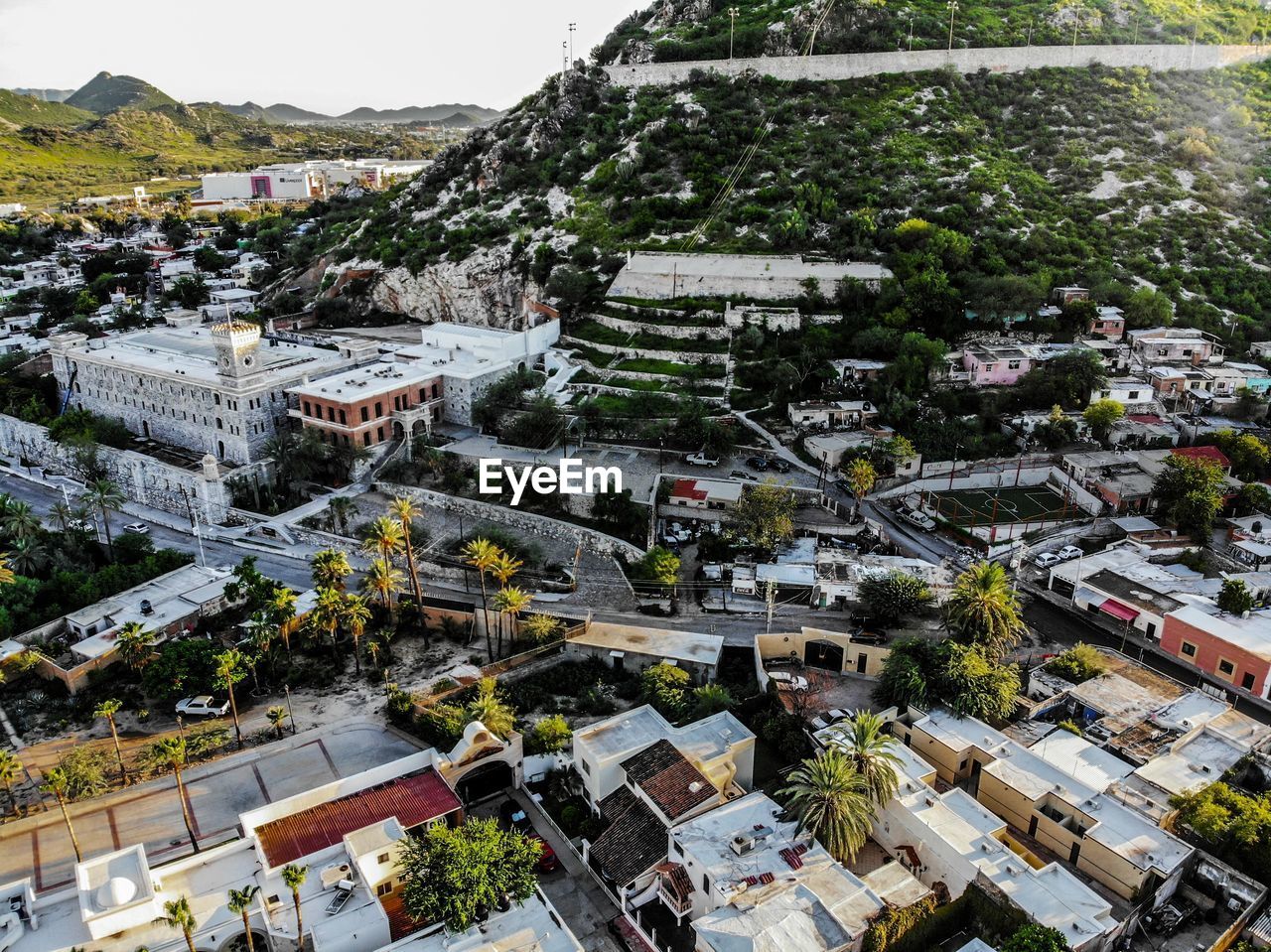 HIGH ANGLE VIEW OF BUILDINGS AND STREET