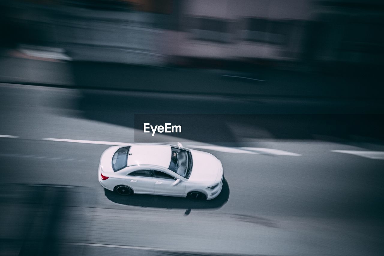 Blurred motion of car moving on road