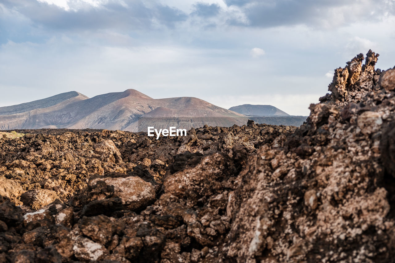 Rock formations in desert against sky