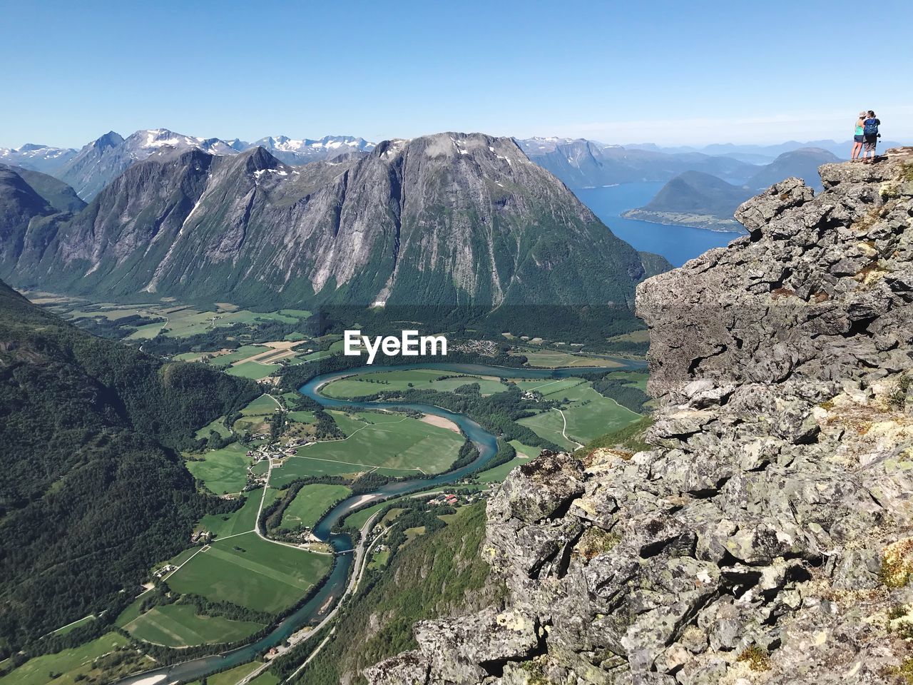 Panoramic view of landscape and mountains against clear sky