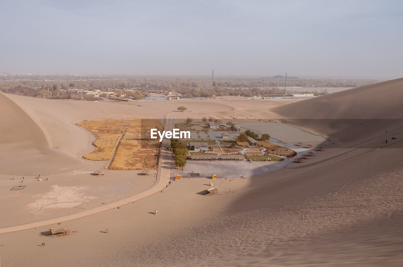 Aerial view of desert against sky