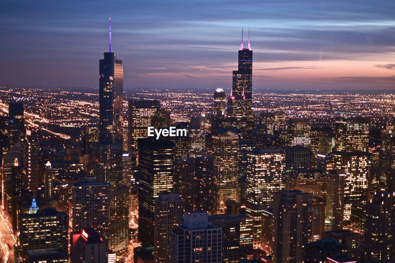 Illuminated cityscape at night