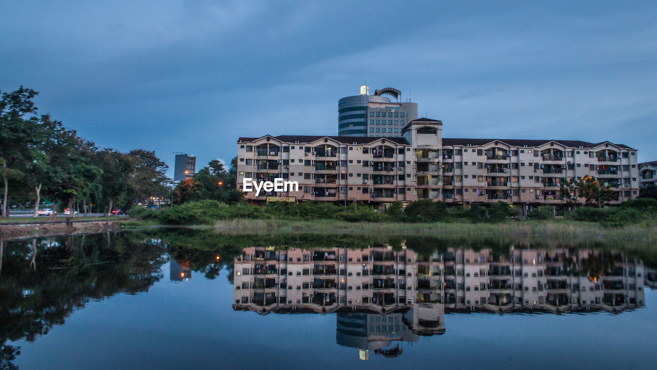 REFLECTION OF BUILDING IN WATER