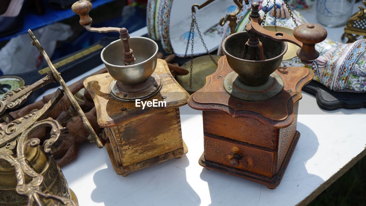 High angle view of retro style coffee grinder for sale in market