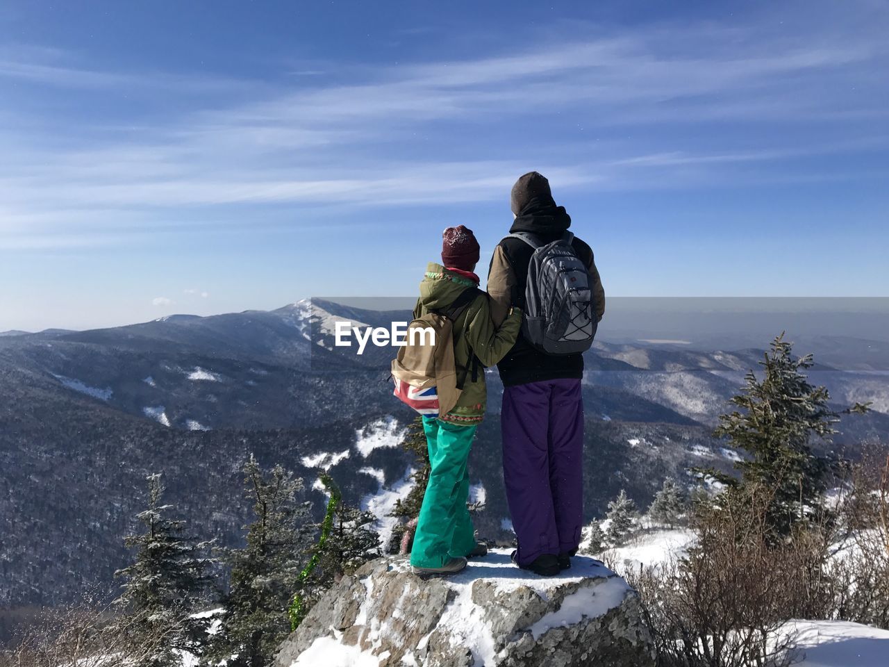 Rear view of couple on mountain top