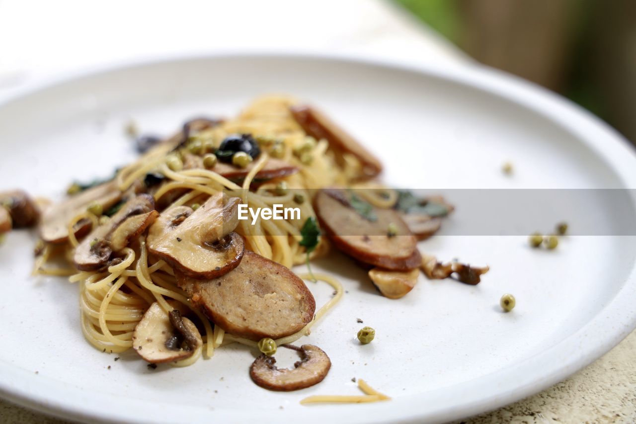 CLOSE-UP OF MEAL SERVED ON TABLE