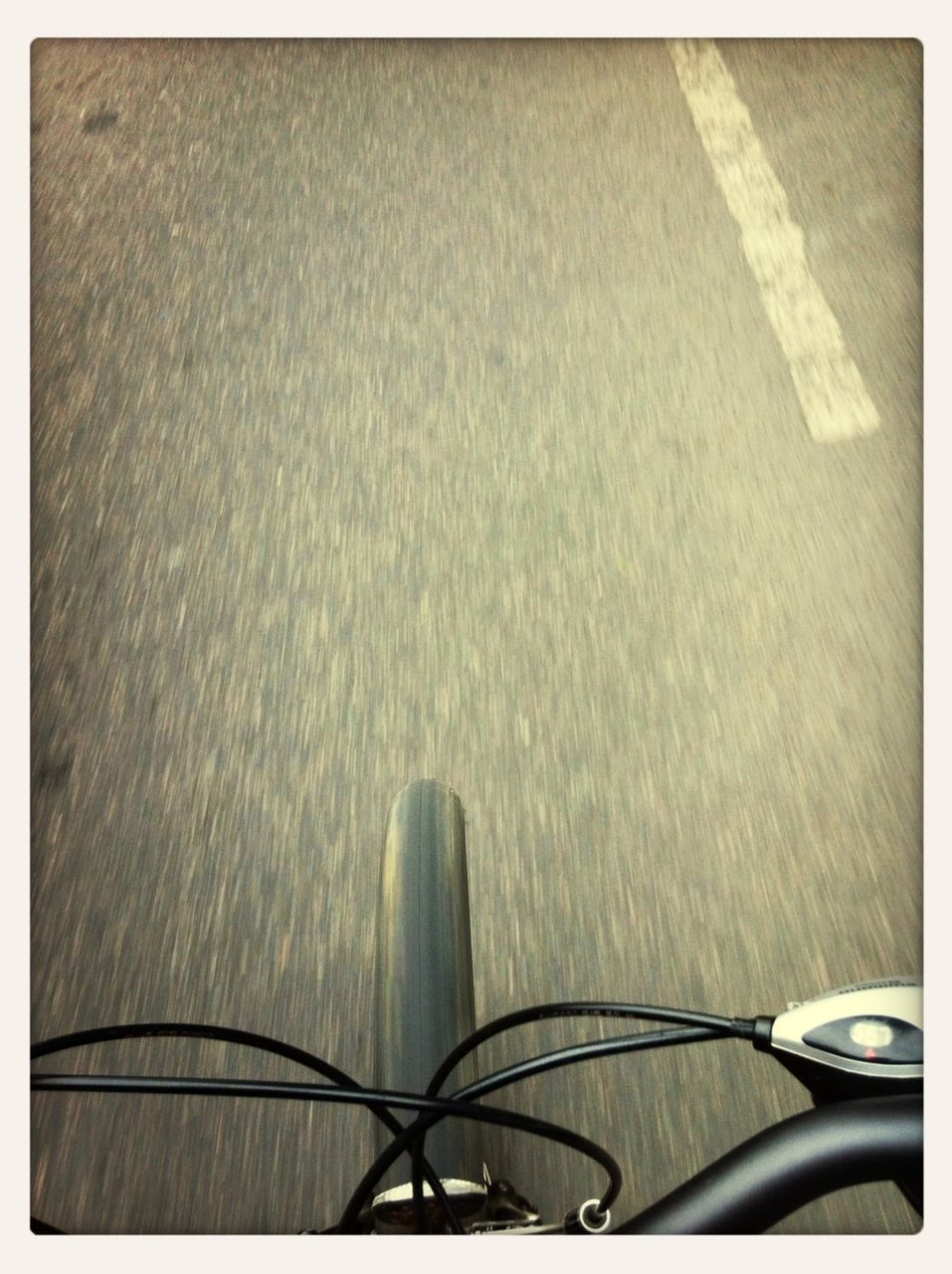 Detail shot of bicycling on road