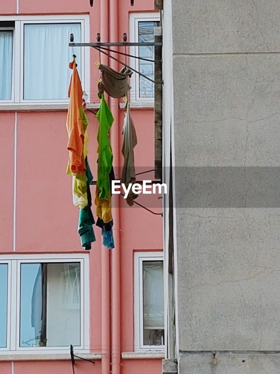 CLOTHES DRYING AGAINST BUILDING