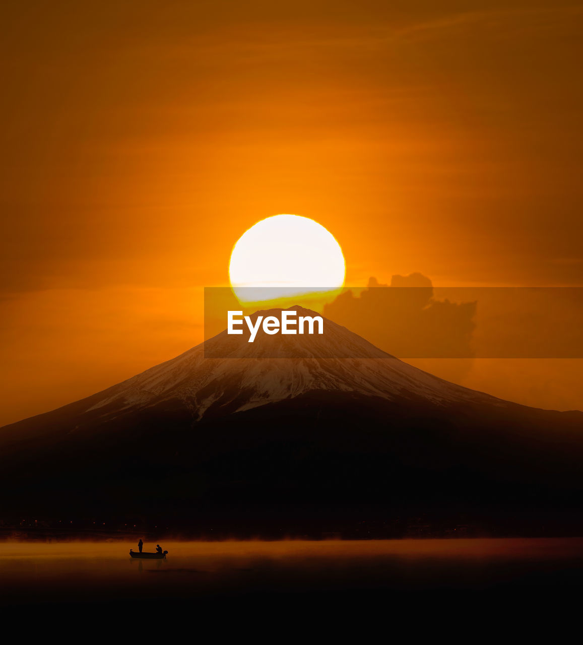 Scenic view of mountain against sky during sunset