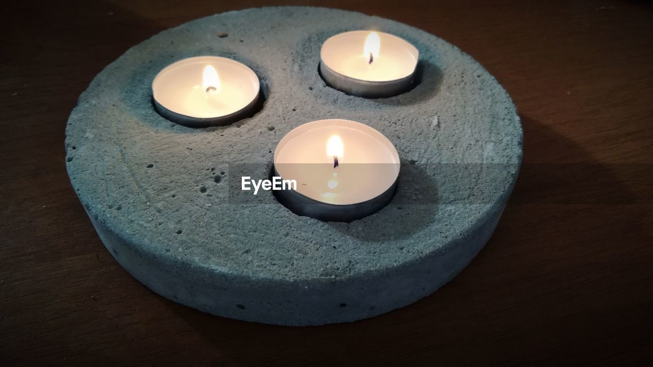 High angle view of candles on table