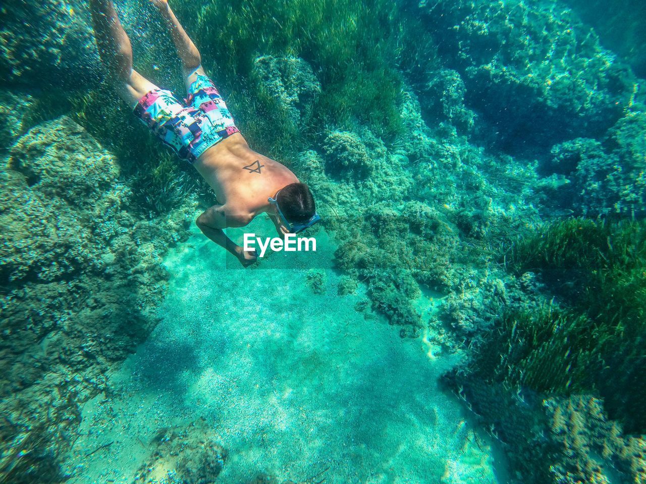 Man swimming in sea