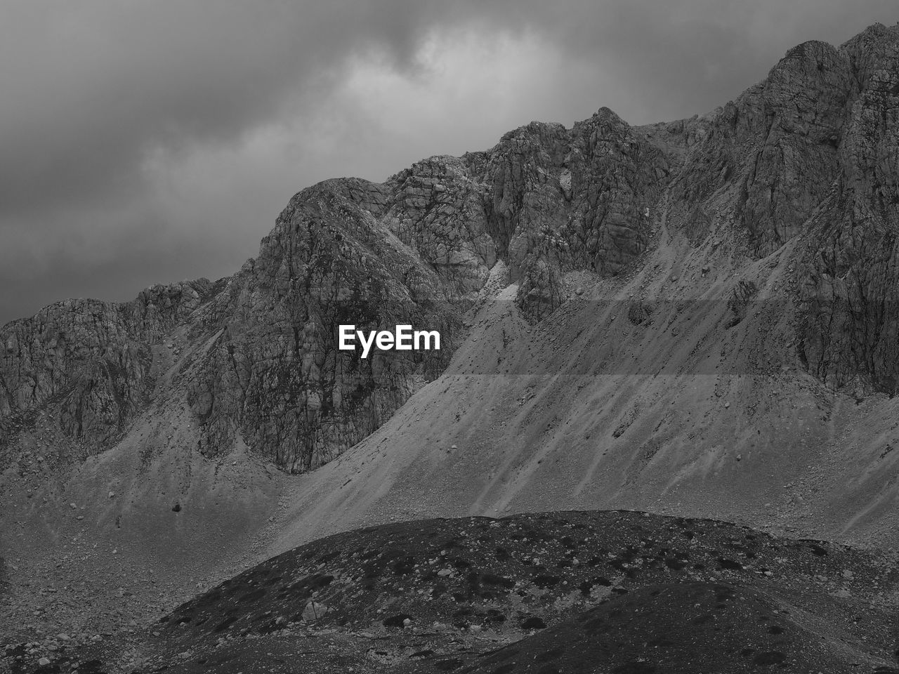 Scenic view of rocky, rugged mountains against sky