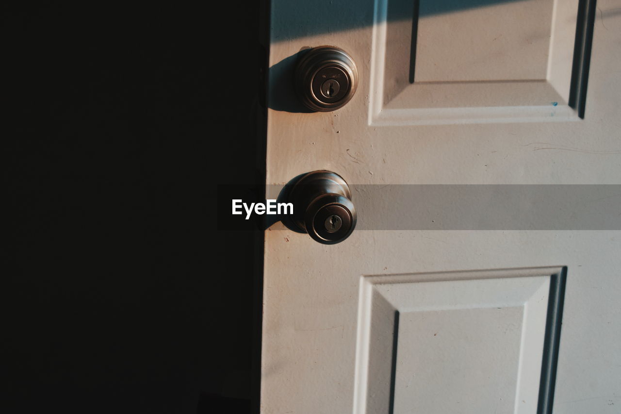 door, doorknob, door handle, no people, sunlight, protection, day, outdoors, architecture, close-up