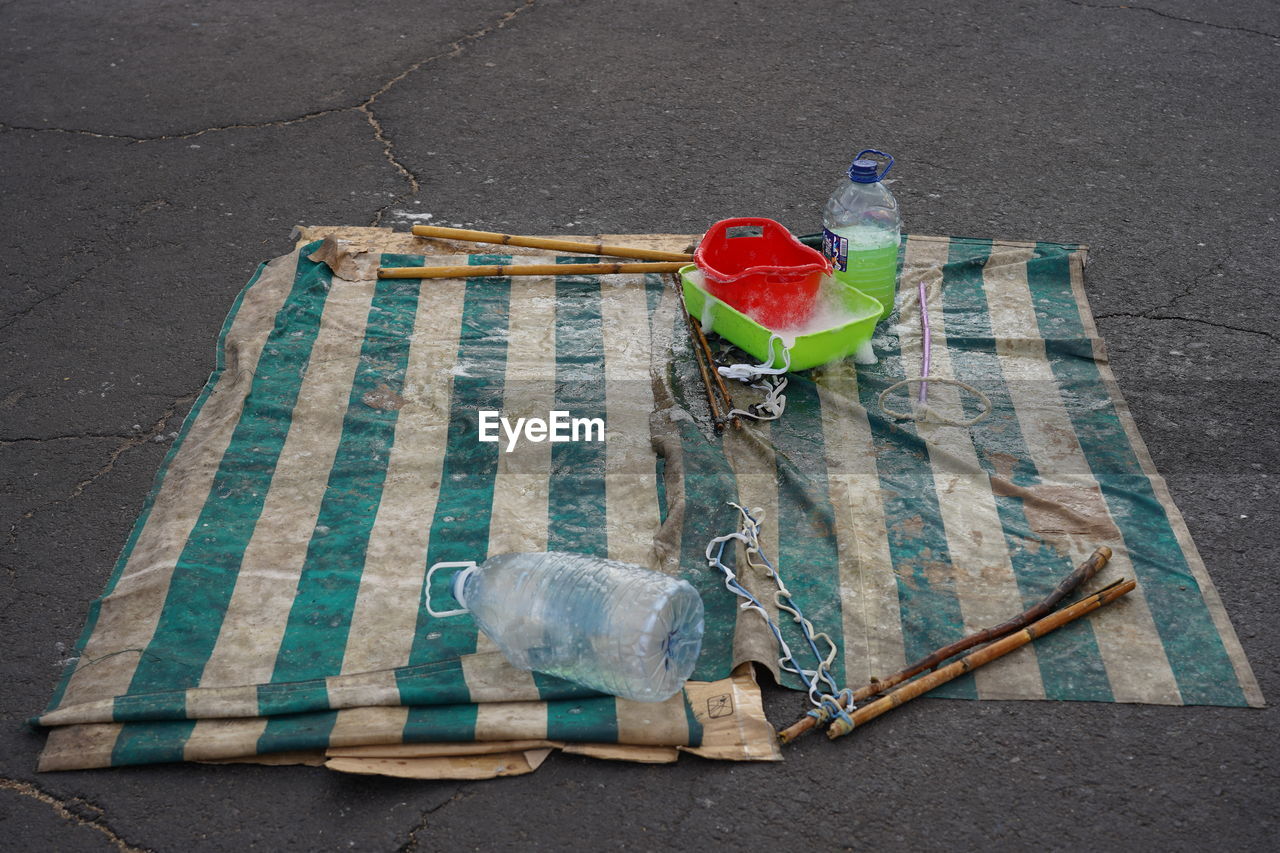 Tools of street artist to make soap bubbles to entertain pedestrians and tourists in tenerife 