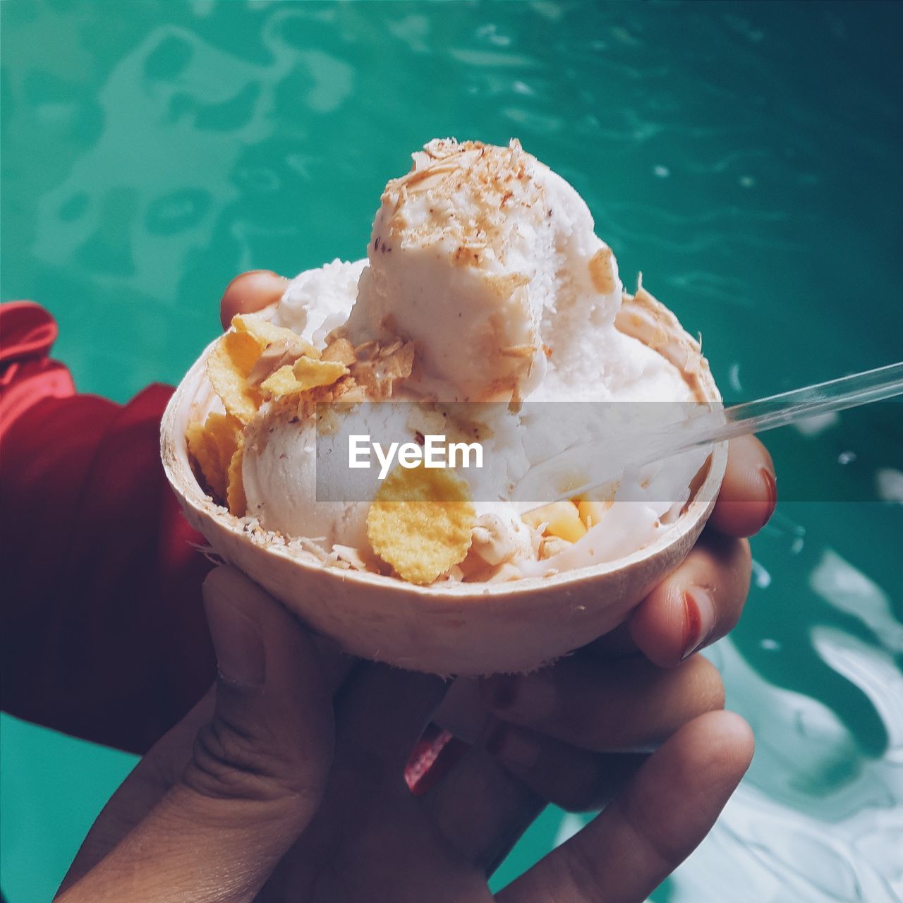 High angle view of man holding ice cream