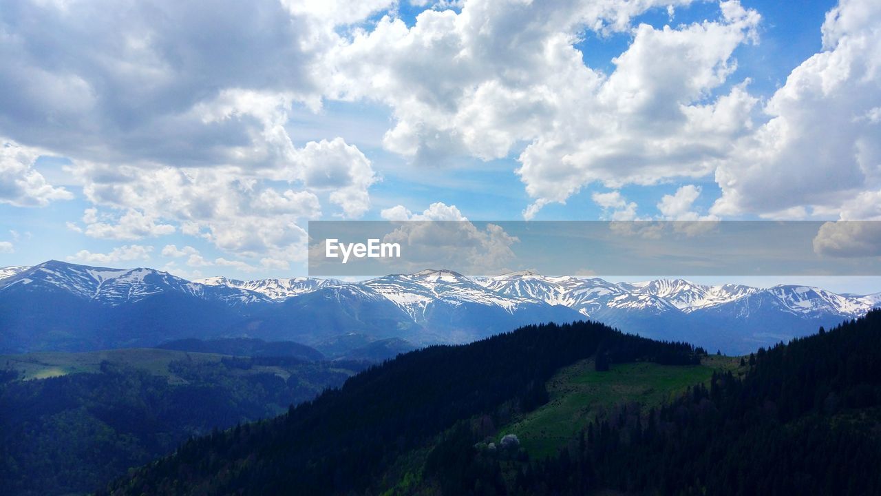 PANORAMIC SHOT OF MOUNTAINS AGAINST SKY