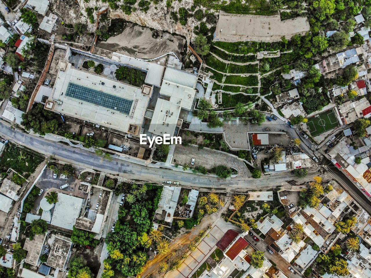 HIGH ANGLE VIEW OF TREES AND BUILDINGS