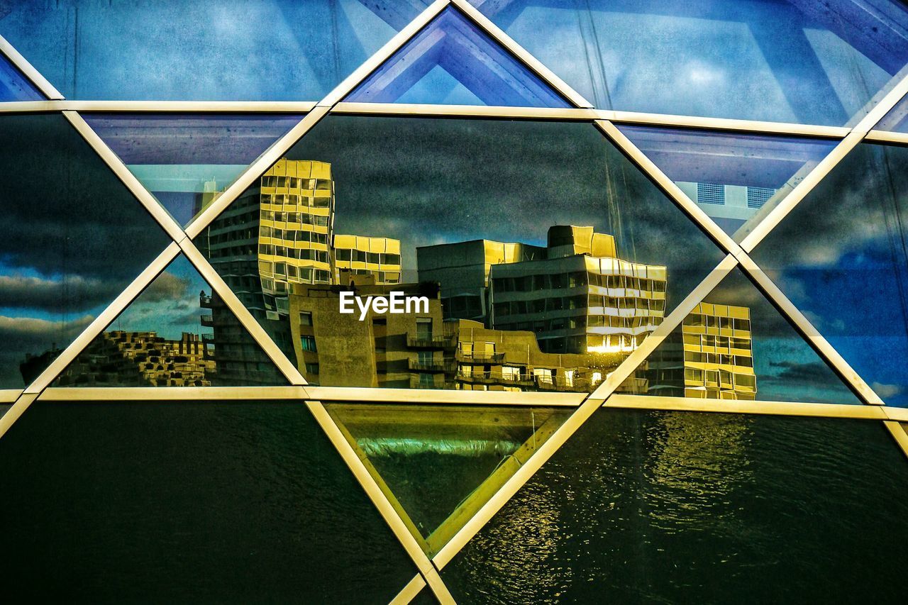 Digital composite image of modern building against sky