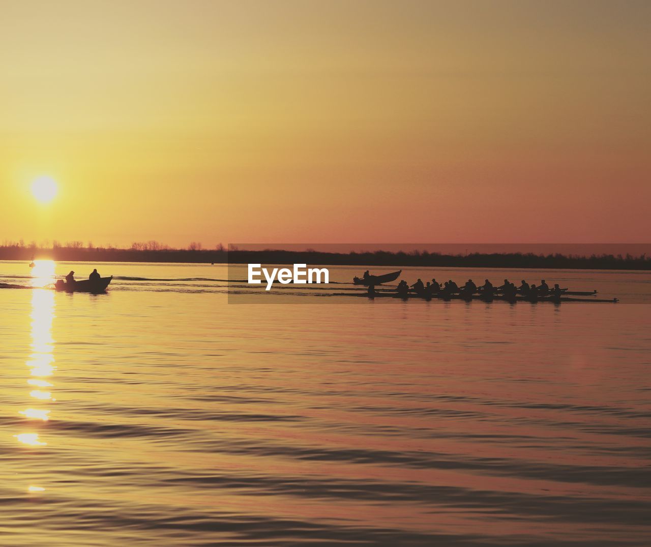 SCENIC VIEW OF SEA AGAINST ORANGE SKY