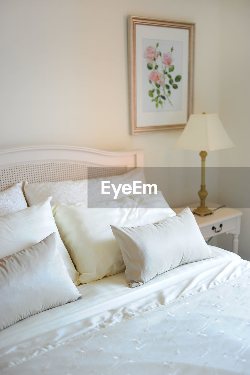 High angle view of pillows on bed at home