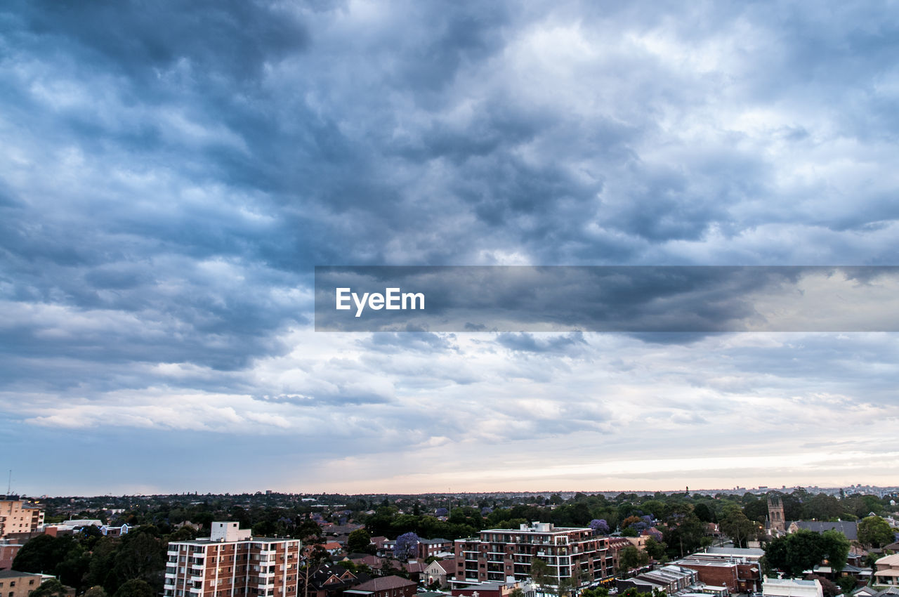 STORM CLOUDS OVER TOWN