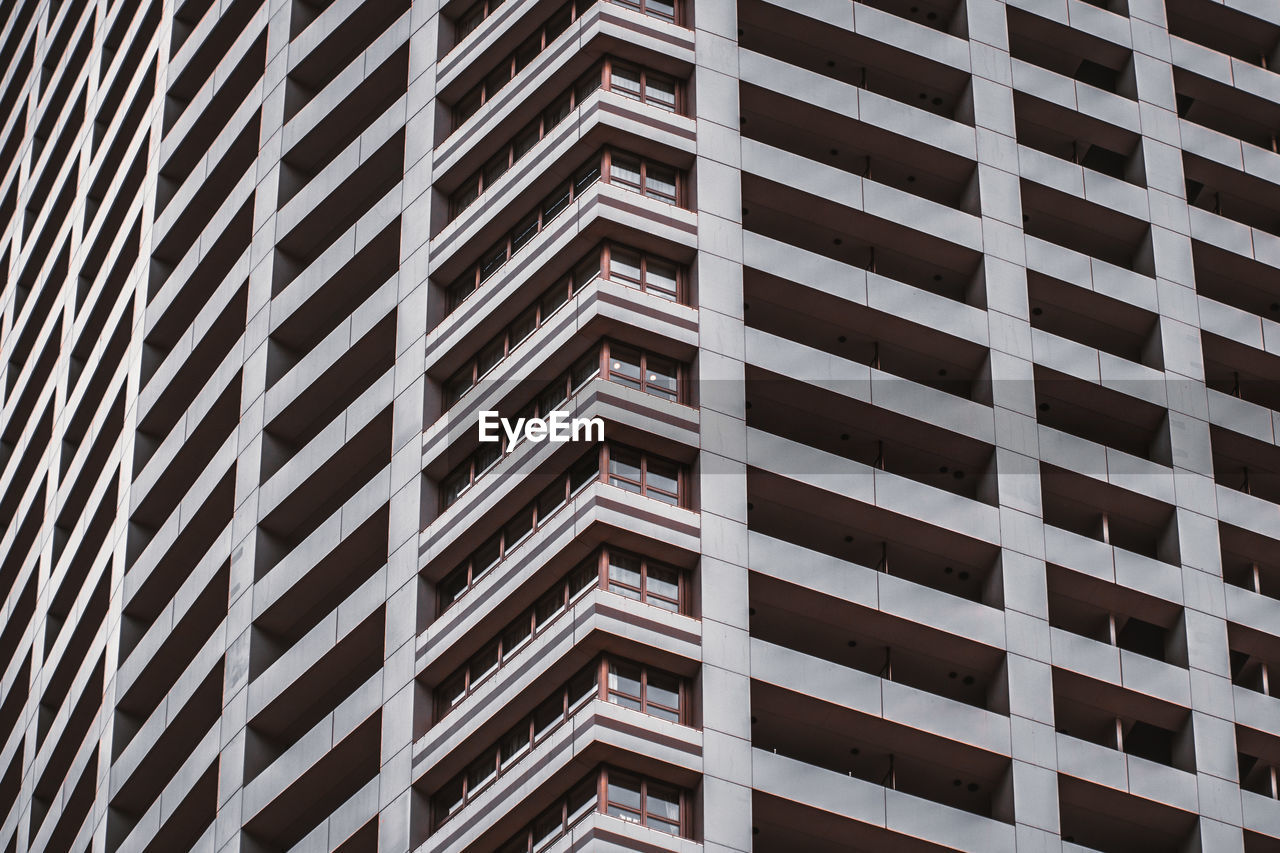 Low angle view of modern buildings against sky