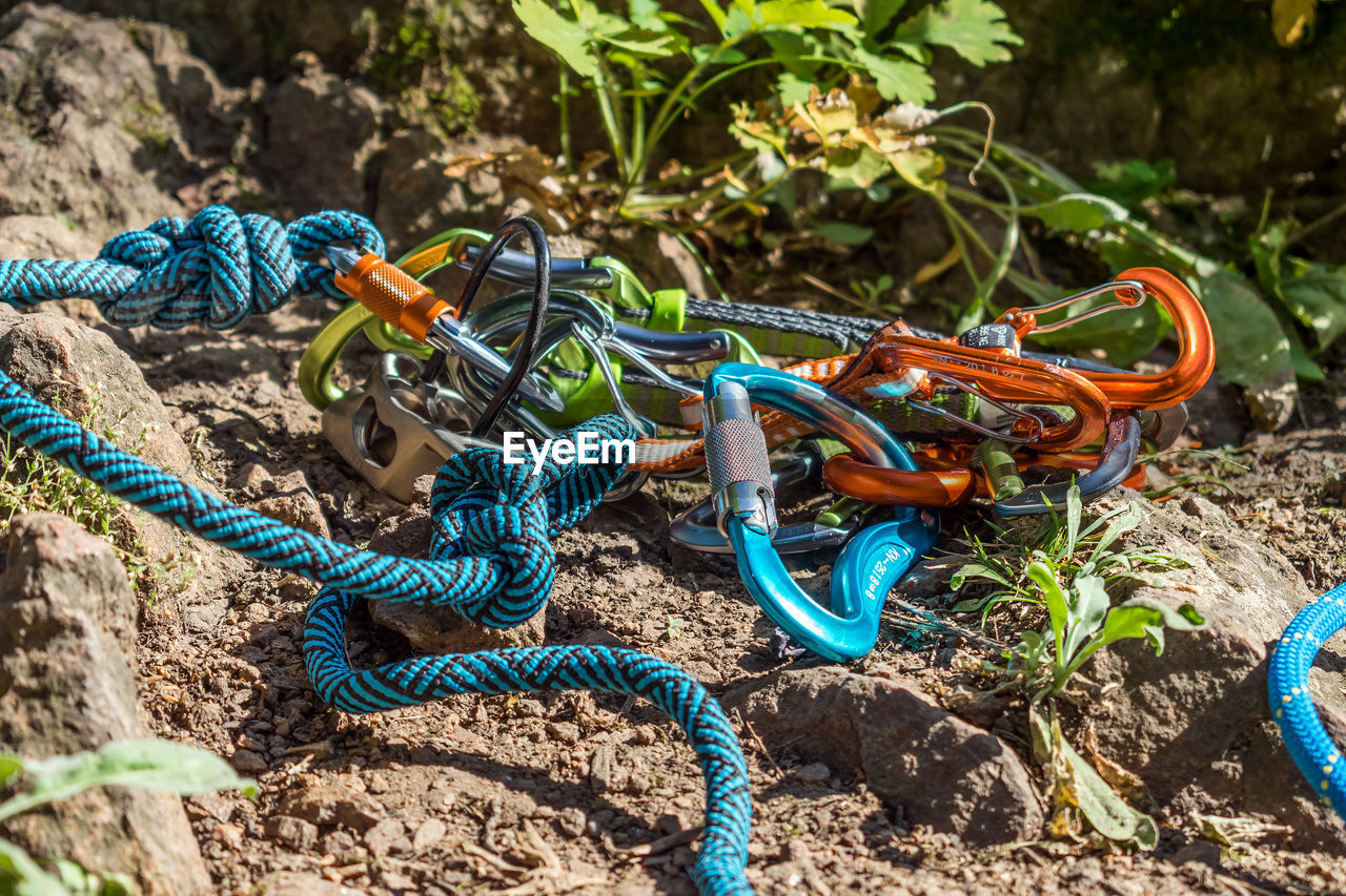 High angle view of ropes on rock