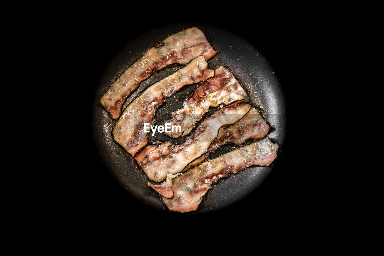 High angle view of meat on barbecue grill