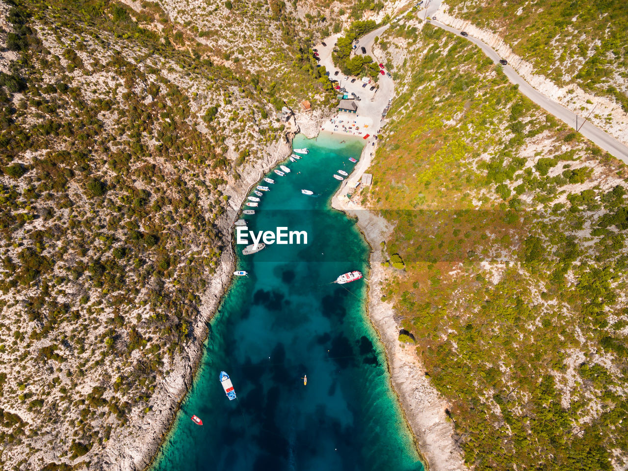 Aerial view of sea and landscape against sky