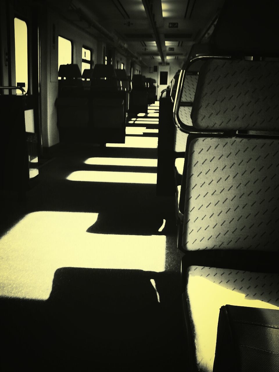 View along aisle of subway car