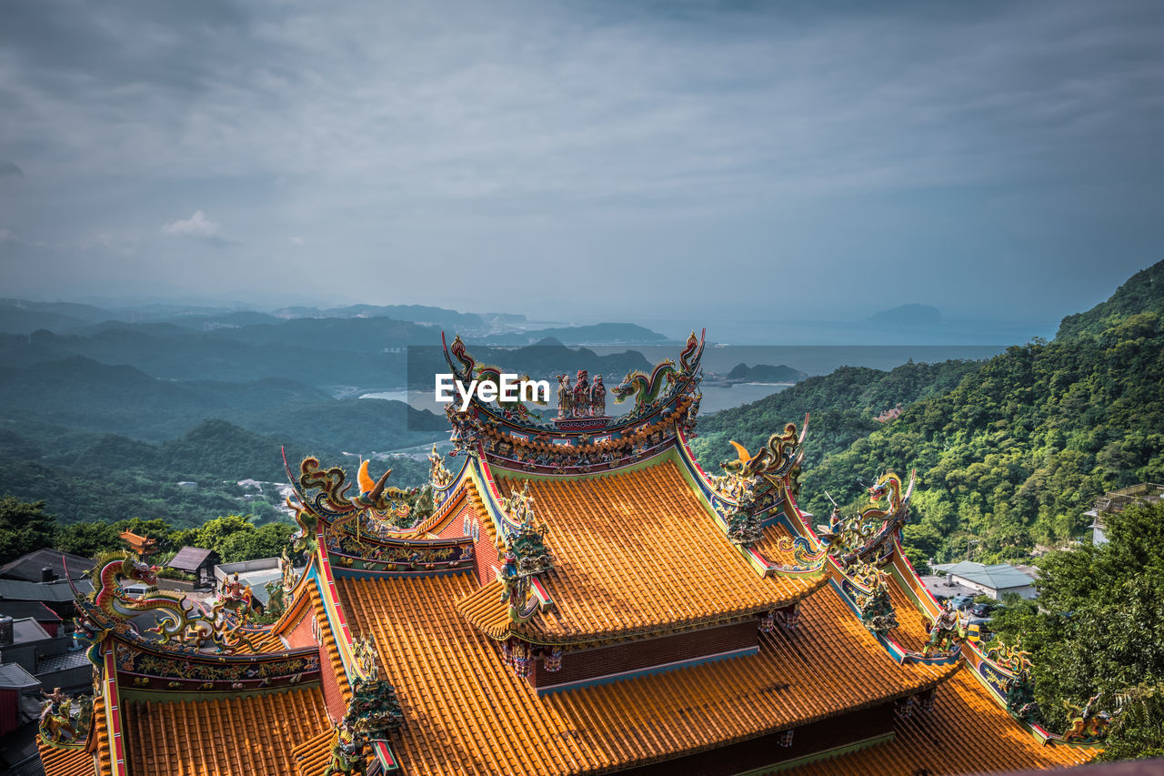 View of the roof of chinese temple at jiufen old street village on the hill in taiwan.