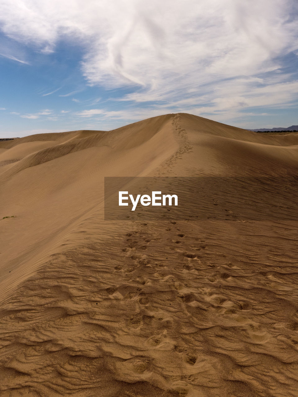 Scenic view of desert against sky