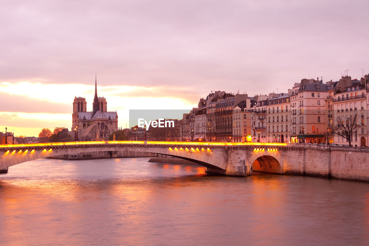 Apartments on ile saint louis, notre dame cathedral and pont de la tournelle bridge, paris, france