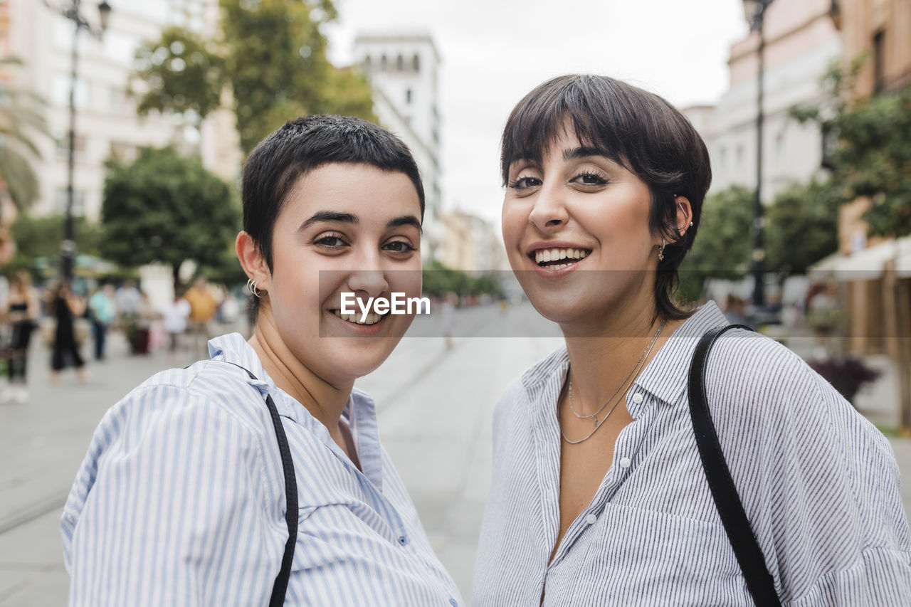 Happy lesbian couple with short hair