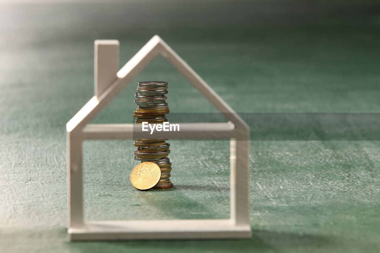 Close-up of coins on table