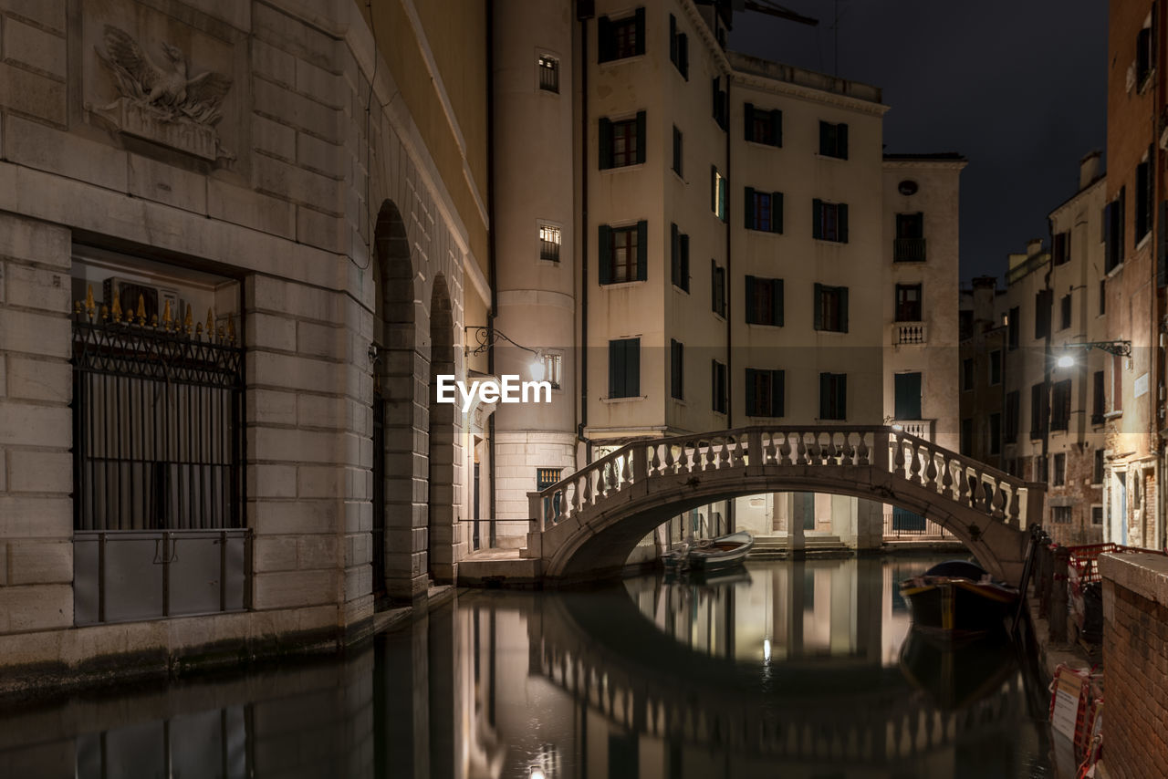 architecture, built structure, building exterior, water, city, canal, night, bridge, building, travel destinations, urban area, cityscape, evening, reflection, illuminated, tourism, waterway, travel, transportation, no people, nature, residential district, nautical vessel, arch, waterfront, outdoors