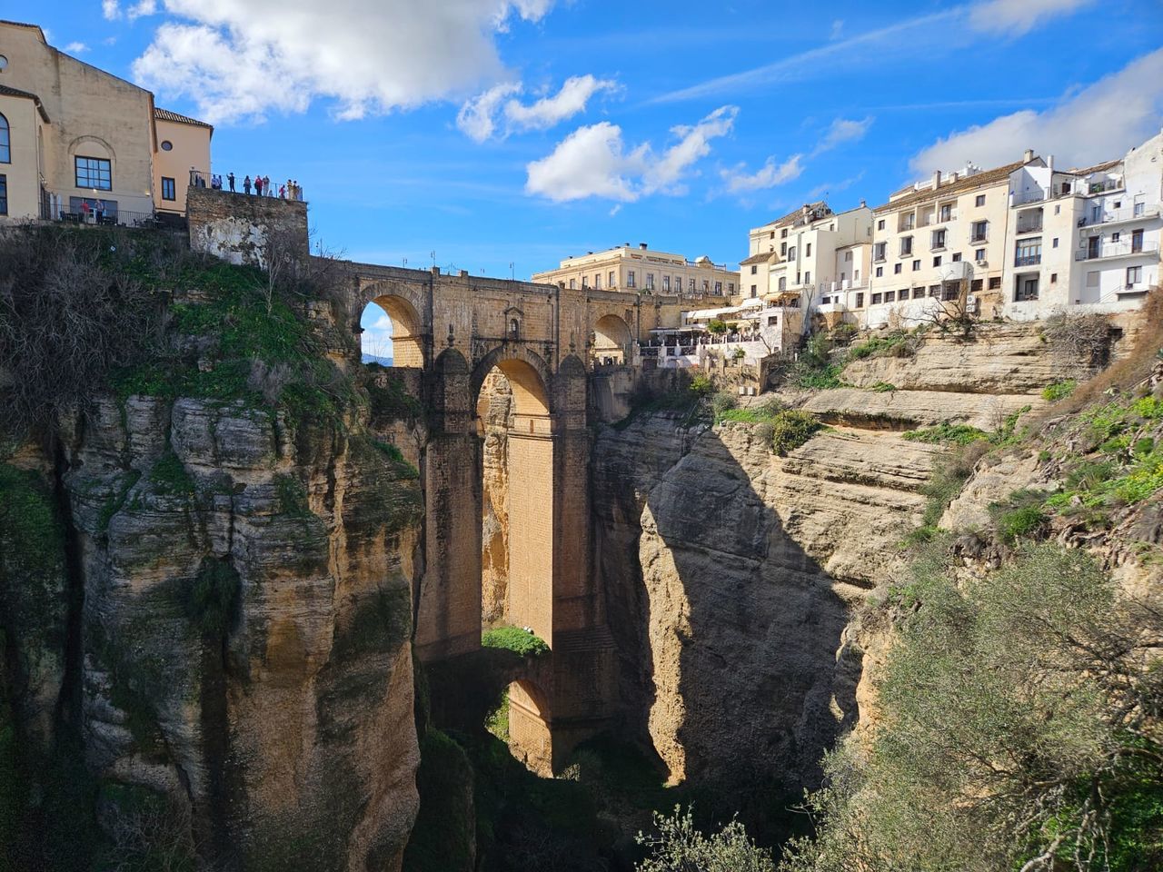 architecture, built structure, history, the past, travel destinations, building exterior, sky, tourism, nature, town, travel, landmark, ruins, ancient, city, fortification, cloud, ancient history, building, old, no people, outdoors, plant, landscape, blue, castle, old ruin, medieval, tree, arch, land, historic site, vacation, environment, stone material, day, rock, holiday, wall