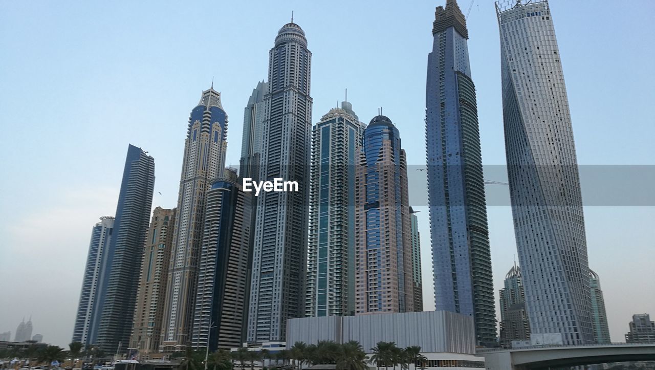 Low angle view of skyscrapers against sky