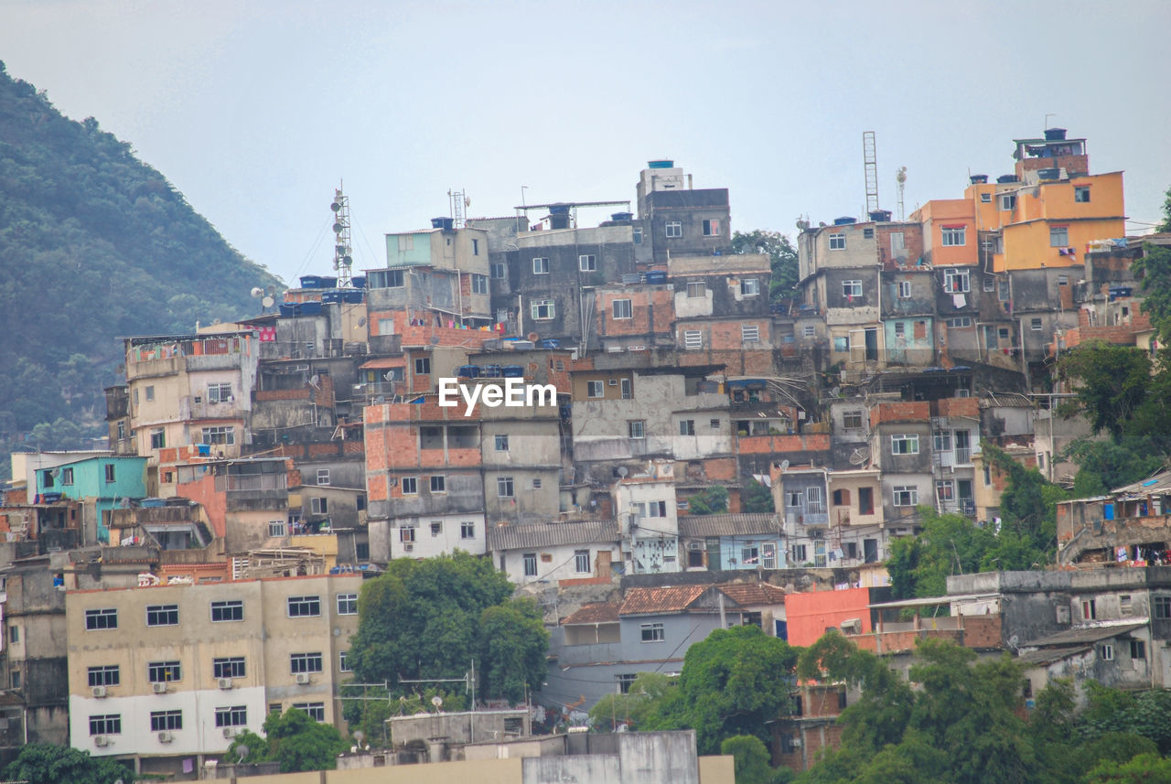 buildings in town against sky