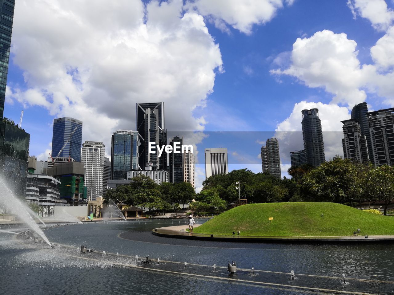 VIEW OF CITY BUILDINGS AGAINST SKY