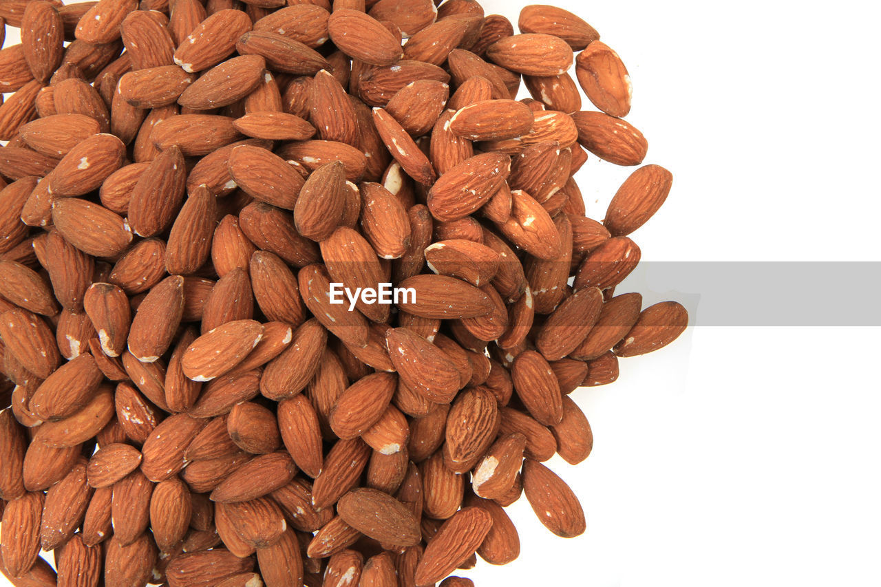 food and drink, food, produce, plant, healthy eating, white background, large group of objects, freshness, brown, wellbeing, nuts & seeds, indoors, cut out, abundance, no people, studio shot, sunflower seed, close-up, still life, nut, nut - food, seed