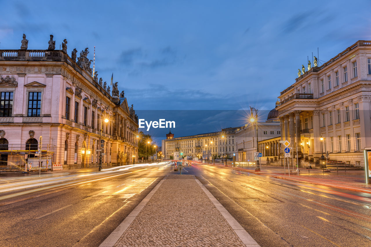The famous unter den linden boulevard in berlin with its historic buildings at night