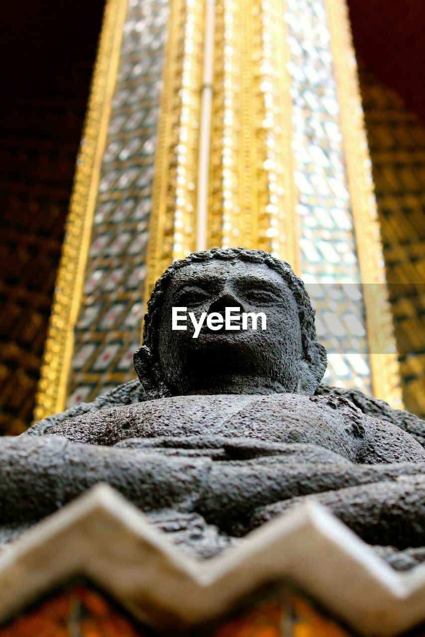 Close-up of statue in temple